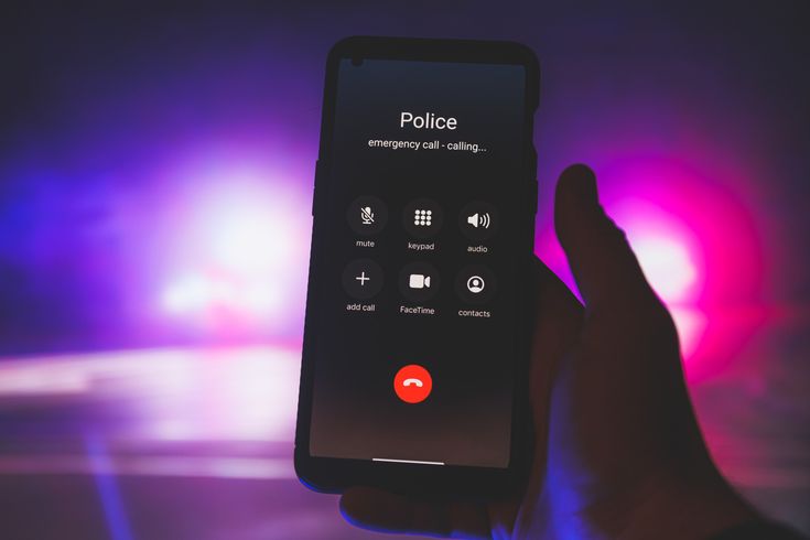 a person on the phone to a romance scammer