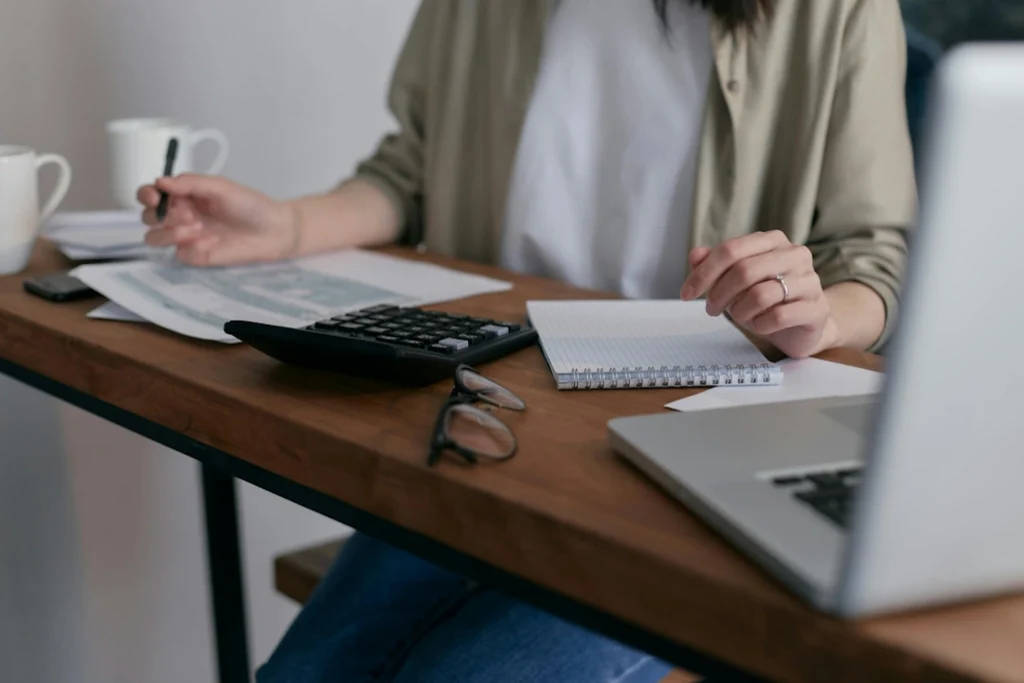 A picture of a woman working at her desk